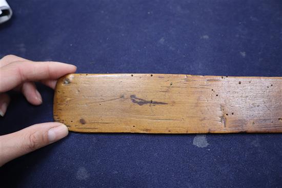 An 18th century treen stay busk dated 1770 and initialled SL length 30cm